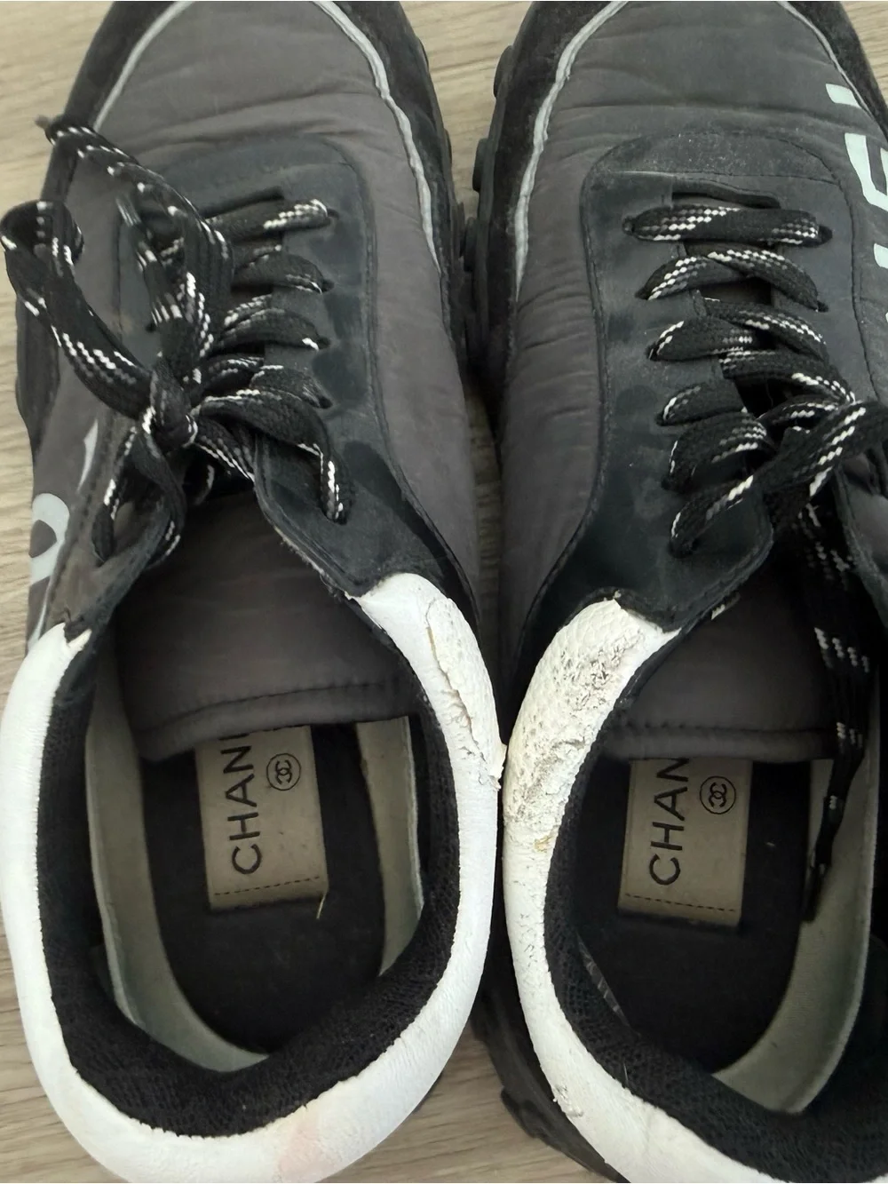 CHANEL Black and White Men’s Logo Running Sneakers
